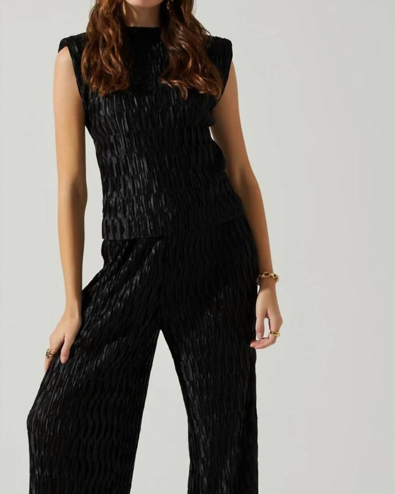 Front of a model wearing a size L Savine Textured Pant in Black in Black by ASTR. | dia_product_style_image_id:338741